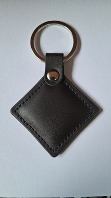 Бесконтактный брелок IC MIFARE 13,56 МГц(MF-Leather ) в кожаном чехле, цвет коричневый MF-Leather фото