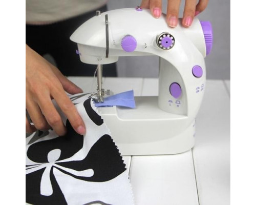 Швейна мінімашинка 4 в 1 Mini Sewing Machine SM201 Швейна мінімашинка 4 в 1 Mini Sewing Machine SM201